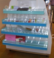 cosmetic display point of purchase store fixture makeup metal custom fabricated